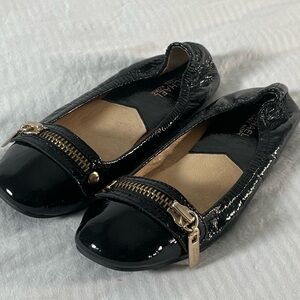 NWOT Michael Kors Black Patent Leather Flats - Size 7M Gold Metal Trim Zipper